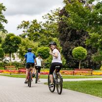two students on bikes in Creek Park 