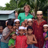 Teacher in India with a group of young boys