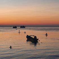 sunset over the water in Koh Tao