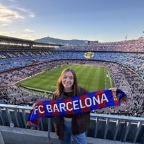 A student at Camp Nou, watching FC Barcelona