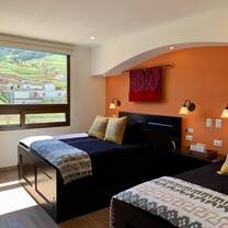 Hotel room with yellow wall