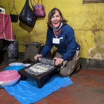 Woman with rolling pin making food