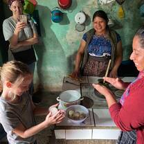 Four women in kitchen