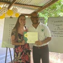 volunteer receiving a certificate 