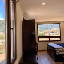 Hotel room with bed and closet