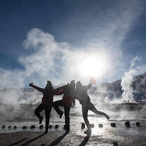 Students in front of geysers in Chile
