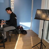 Music student playing in IES Milan Center