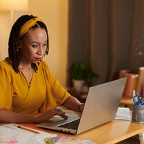 girl doing work on a computer