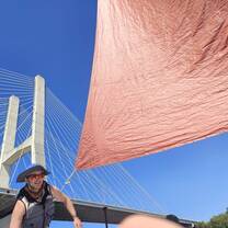 Heading under a bridge on the river