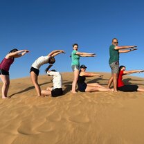 Students spell out CGEE in the Dunes in Namibia