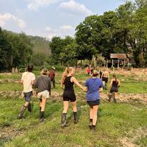 a group is volunteering in a field 
