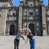 Students making the heart symbol in Mexico