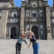 Students making the heart symbol in Mexico