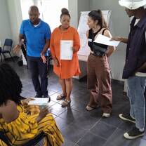 People presenting on a classroom