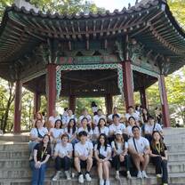 Group photo at monument