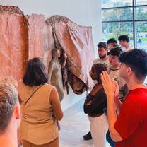 CYA students looking at sculptures