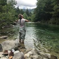 standing by river