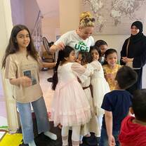 Children brining smiles to the staff and volunteers at the centre
