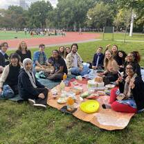 Students having picnic in park