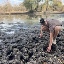 Checking on elephant tracks at one of the pans 