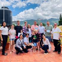 Group photo holding Spanish certificates
