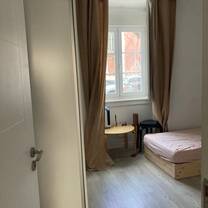 Sunny private room with 2 twin beds in the heart of Lisbon