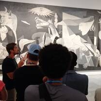Our teacher with the Guernica
