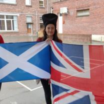 Students holding British flags