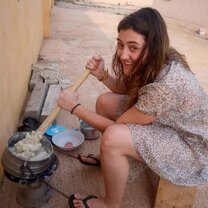 International student enjoying Ghanaian cooking lessons