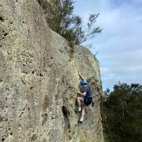 Student rock climbing