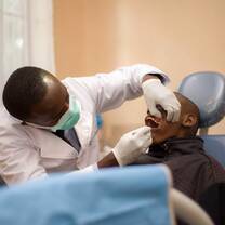 A dentist doing a dental check-up during Go-Elective Dental Internship in Kenya