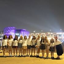 Group photo in front of concert venue