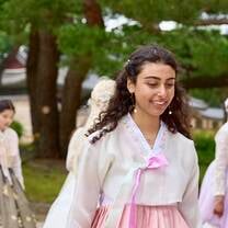 Woman in a pink hanbok