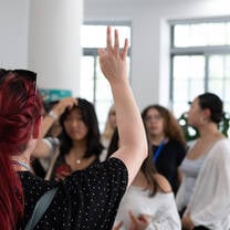 Director getting students' attention