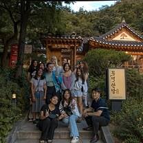 Group photo outside a restaurant