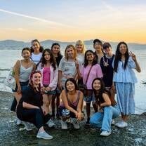 Group photo by the ocean