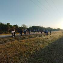 People waking down the road