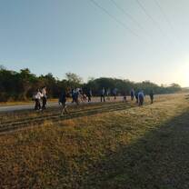 People waking down the road