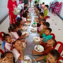 Volunteer with children in Cambodia