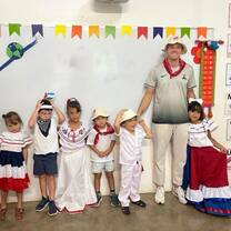 TEFL graduate celebrating Costa Rican culture with his students