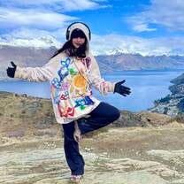 Yoga pose on top of mountain