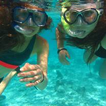 Students snorkeling during their education abroad program.