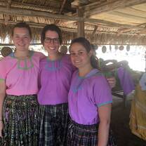 Students having a Kitchi Maya cultural immersive experience in Belize