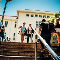 Students walking down stairs at Stellenbosch University