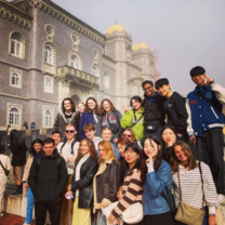 Large group of students pose for a picture in Portugal