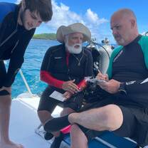 Divemaster candidates having serious mentoring from one of our instructors