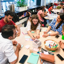 Teams working on creative assignments