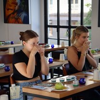 Students enjoy an olive oil tasting in Italy