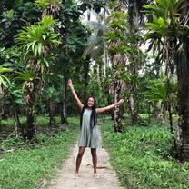 Participant posing in rainforest in Costa Rica