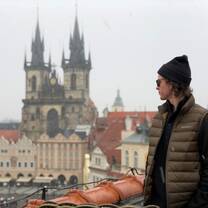 Student overlooks beautiful architecture 